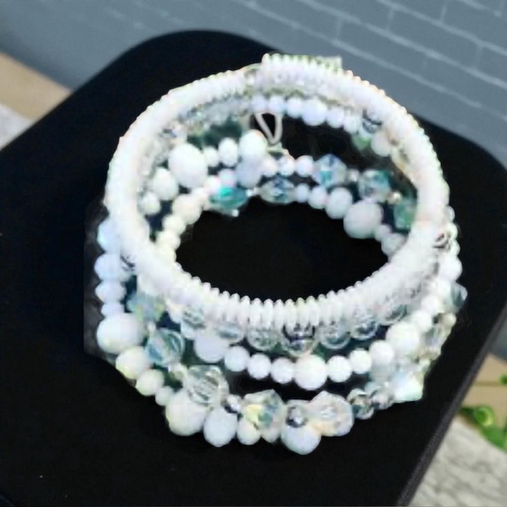 White Memory wire Beaded Bracelet. 5 strands connected.